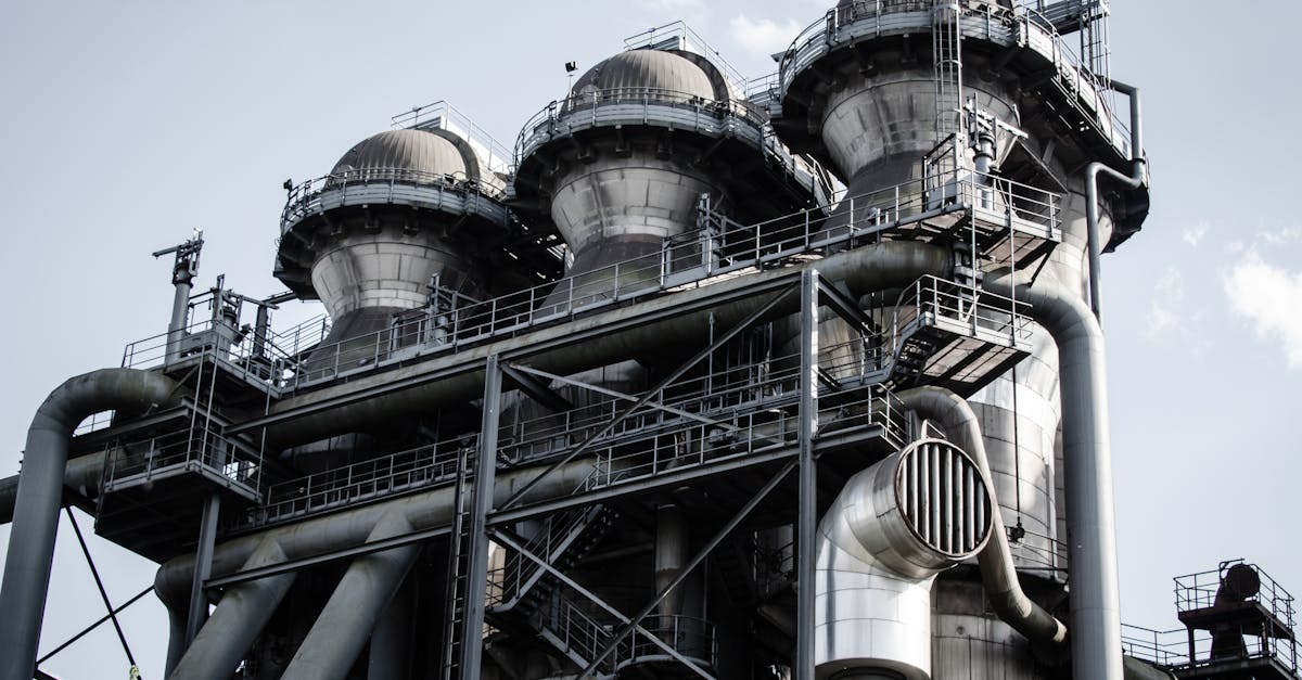 A powerful industrial structure with pipes and machinery in Duisburg, Germany.